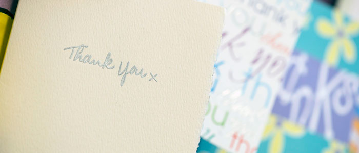 Photo showing cards and letters sent to staff by patients after treatment.