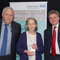Picture of Charlotte Collins with Chief Executive Stuart Bell CBE and Chairman Martin Howell