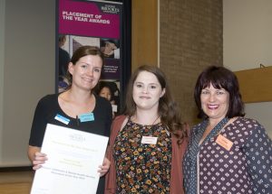 Colleagues from Highfield Unit collect their award