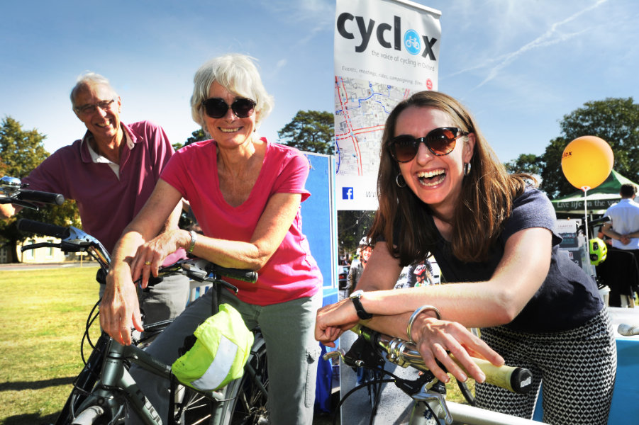 The Oxford Health Charity's Healthfest 2019 at The Warneford Hospital, Oxford. L to R, James and Kathryn McNicoll with Becci Curtis on the Cyclox stand.