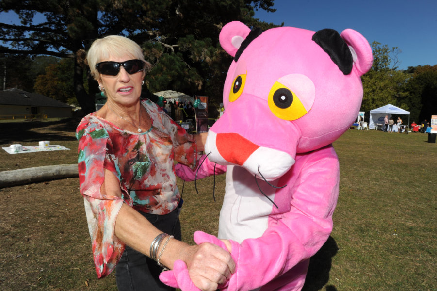 The Oxford Health Charity's Healthfest 2019 at The Warneford Hospital, Oxford. The Pink Panther mascot dancing with Chris Varney.